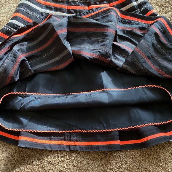Anthropology HD in Paris circle skirt with bright orange and black strips. - Picture 4 of 4